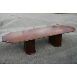An Art Deco design oak dining/boardroom table, top 140" x 48", on ribbed pedestals