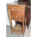 A late 19th century French walnut marble top bedside cupboard, fitted one drawer over cupboard, on