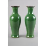 A pair of Chinese green crackle glazed baluster vases, 9" high