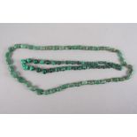 A jadeite graduated pebble bead necklace, 36" long and a malachite graduated bead necklace with