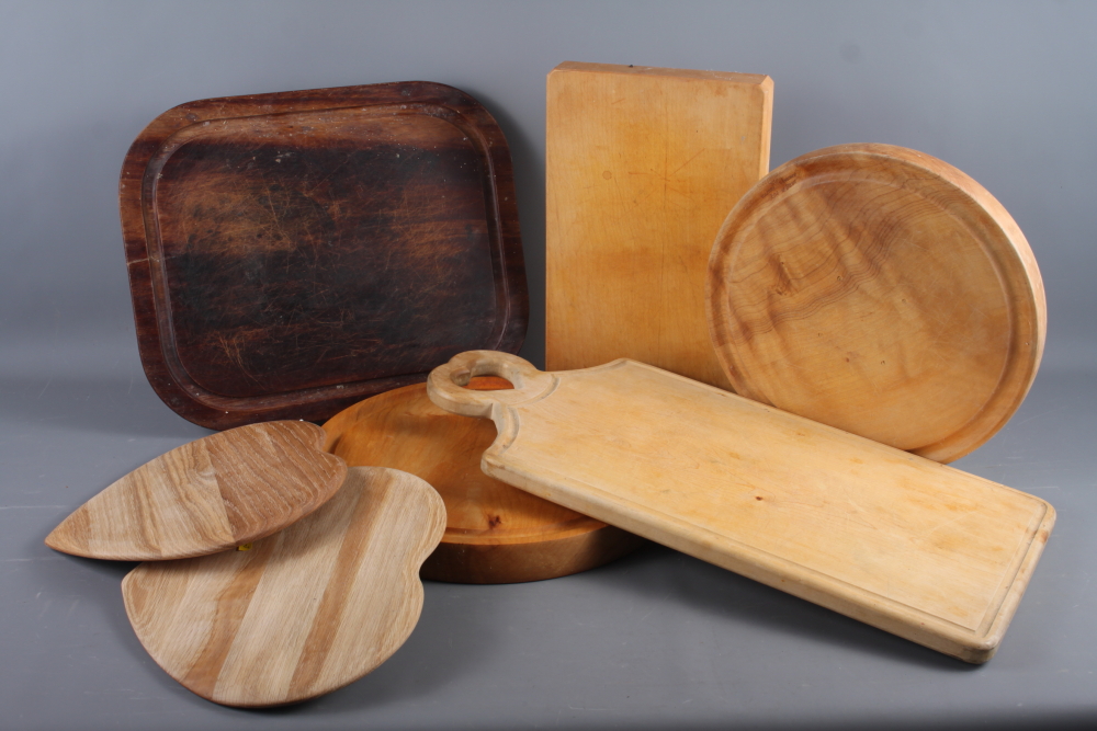 A number of wooden bread/chopping boards of various size and design