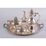 A silver plated four-piece tea and coffee set with engraved decoration and a similar two-handled