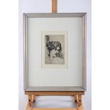 Augustus John: a signed etching, "Woman's head", 5 3/4" x 3 7/8", in painted frame