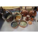 A copper side-handled coffee pot, two copper coal scuttles, two warming pans and other items