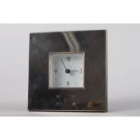 A silver cased square shaped quartz mantel clock with white metal enamel dial and Arabic and
