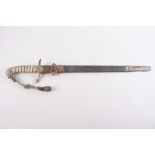 A midshipman's mid 19th century naval dirk and scabbard with sword knot, blade inscribed "Chief