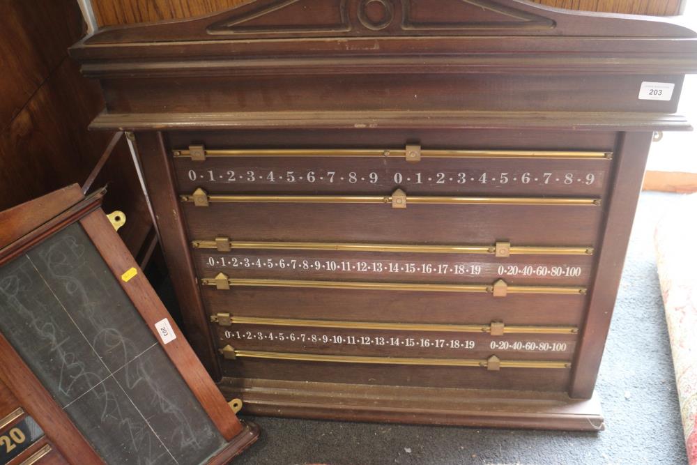 Two wooden snooker scoreboards, a selection of cue rests and other snooker accessories