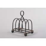 A silver four-division toast rack, 5.5oz troy approx