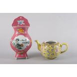 A Chinese porcelain vase-shaped wall pocket with landscape panel on a pink ground, 10 1/2" high, and