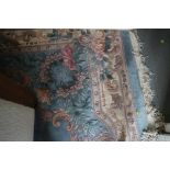A pair Chinese contour pile carpets with floral design on a light blue ground, 120" x 94" approx