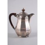 A silver hot water jug with fruitwood knop and handle, 12.2oz troy approx