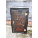 An early 18th century chinoiserie lacquer decorated corner cupboard enclosed panel door, 20 1/2"