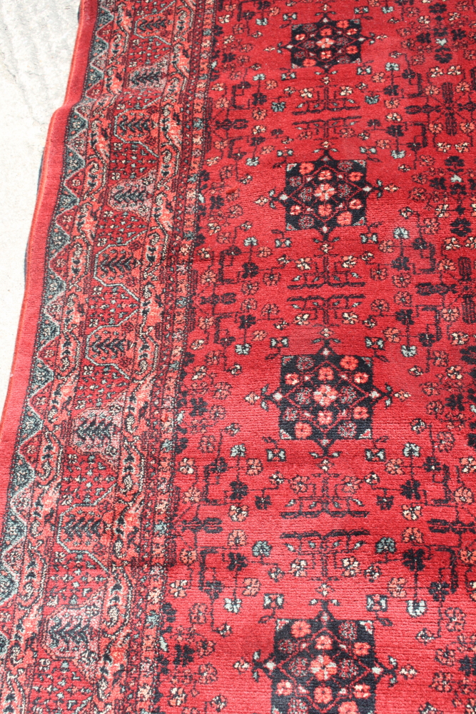 A Royal Kashqai Afghan style pile rug with eight central elephant guls and multi-borders on a - Image 3 of 5