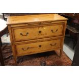 A 19th century French provincial fruitwood commode, fitted slide over two drawers, on square taper