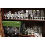 A quantity of pedestal drinking glasses, including "Luigi Bormioli Raffaello" champagne glasses,