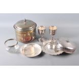 A pair of silver plated goblets, a muffin dish, a Continental white metal topped jar and other items