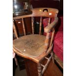 A tub shape elbow chair and a cane seat bedroom chair