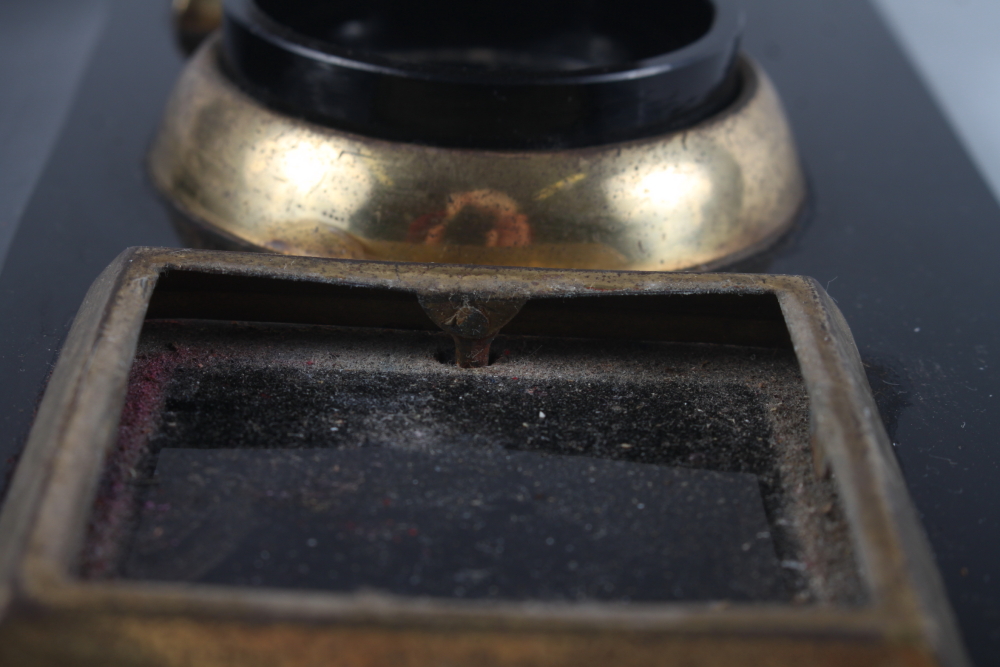 A 1930s black glass desk inkstand, 11" wide (two feet missing) and a desk weight - Image 2 of 3