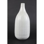 Peter Lane: a porcelain ribbed tapering vase, 7 1/2" high