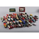 A quantity of mostly Matchbox advertisement trucks, a Models of Yesteryear American Loco, and