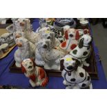 Three pairs of Staffordshire dogs, six other Staffordshire dogs, largest 12 3/4" high (damages),