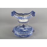 A 19th century blue and white transfer decorated cheese trough and a blue and white tureen and