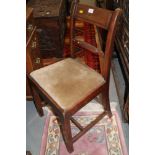 An early 19th century mahogany standard chair with rope twist back rail and a pair of early 20th