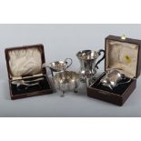 A silver christening cup, in box, a spoon and pusher, in box, a Victorian silver christening cup, an