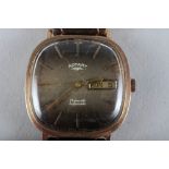 A gentleman's Rotary 9ct gold cased automatic wristwatch with baton numerals and day/date aperture