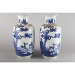A pair of Chinese porcelain blue and white baluster vases, decorated fallow deer, 17 3/4" high