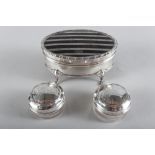 A silver and tortoiseshell banded oval trinket box and two silver topped rouge pots