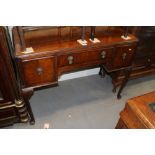 A walnut kneehole dressing table, on cabriole supports, 42" wide