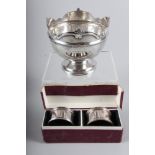 A silver trophy bowl and a pair of napkin rings, 5.1oz troy approx