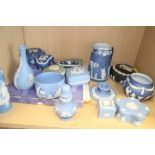 A quantity of jasperware, mostly Wedgwood, including trinket boxes, vases, a sugar shaker and