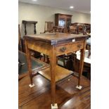 An Edwardian rosewood and inlaid envelope card table, on square taper supports united by an