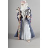 A Lladro Millennium porcelain figure of an old bearded man representing Time, 10" high with