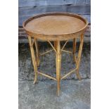 A rattan tray top circular table, 25" dia