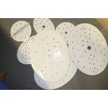 Six assorted white ceramic dish drainers