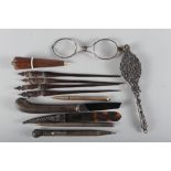 A Tiffany sterling silver biro, a pair of repousse decorated lorgnettes, two propelling pencils, a