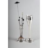 A silver bud vase, on weighted base, 8 1/4" high, a silver mounted hat pin stand and a number of hat