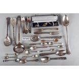 A quantity of silver plated cutlery, including a ladle, a loose canteen of Russian? cutlery,