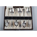 A set of six silver teaspoons, in case