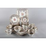 A late 19th century bone china floral and gilt decorated part teaset for ten