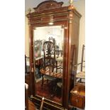 A Napoleon III mahogany cupboard with shaped top, single door inset bevelled mirror enclosed hanging