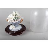 A Lladro porcelain arrangement under a glass dome, "Floral Harmony No 44", 16" high, a similar