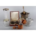 A silver plated wine cooler, 9 1/4" high, a cut glass and silver plated mounted biscuit barrel, a