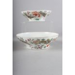 A pair of Chinese porcelain famille verte bowls, decorated with butterflies and flowers, seal mark