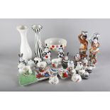 A quantity of Villeroy & Boch china, including salt and pepper shakers, figures formed as