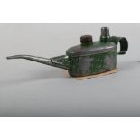 A Sutcliffe green painted oil can, 7" long x 2 1/4" high