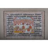 A pair of Indian 19th century watercolours, landscapes with figures, horses and script, in wooden